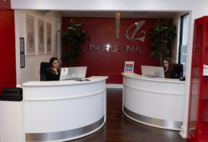 Persona Medical reception with two receptionists